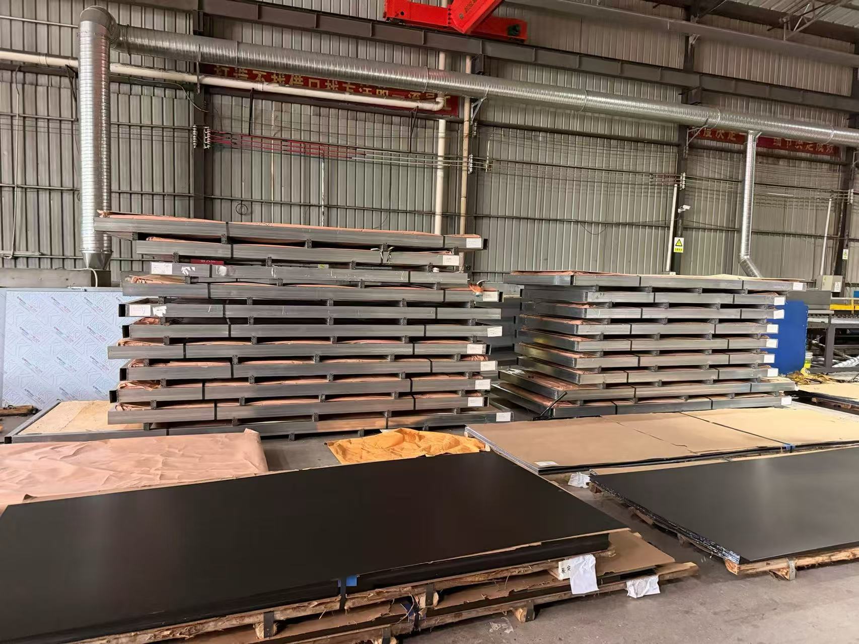 Stainless steel sheet material stock in workshop